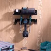 Suport cu raft scule electrice Navaris, 3 unelte, 31.5x22x4.5 cm, montaj perete/pegboard, negru, metal